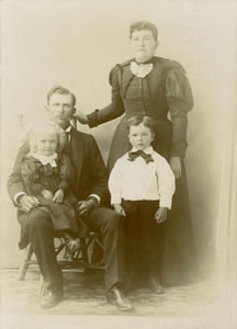 John Francis, Lauretta, Klea, and John Francis Jr.